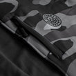 Load image into Gallery viewer, Detail shot of the chest accessory pocket on the Odyssey Activewear Dark Camo Tech Hoodie