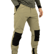 Load image into Gallery viewer, Model wearing Odyssey Activewear Shield Trousers in Khaki with hand in pocket