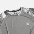 Load image into Gallery viewer, Detail shot of the Odyssey Activewear Arctic Camo T-shirt showing the breathable, quick-drying fabric and grey and white camouflage colour scheme