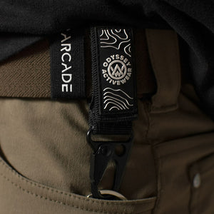 Black Odyssey Activewear Multi-Purpose Snap Hook Strap attached to a belt to secure keys