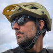 Load image into Gallery viewer, MTB rider wearing Odyssey Activewear Hybrid Sunglasses in black