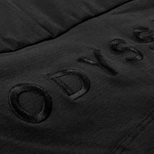 Detail shot of the logo embroidery on the rear of the Odyssey Activewear Shield Trousers