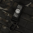 Load image into Gallery viewer, Orion Multi-Purpose Snap Hook Strap attached to a mountain bike MOLLE system
