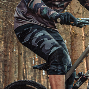 Odyssey Activewear Dark Camo Shield Shorts worn while mountain biking