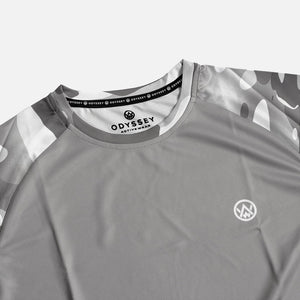 Detail shot of the Odyssey Activewear Arctic Camo T-shirt showing the breathable, quick-drying fabric and grey and white camouflage colour scheme