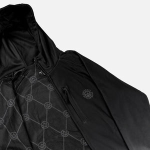 Detail shot of the Odyssey Activewear Noir Black Transition Tech Hoodie