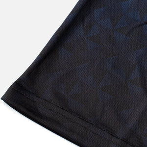 Detail shot of the Odyssey Activewear Triangulation Cobalt jersey showing the breathable and quick-drying fabric