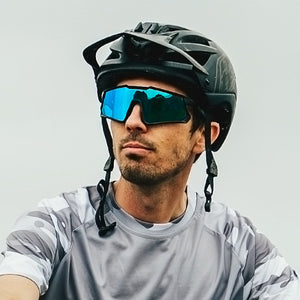 Mountain biker wearing Odyssey Activewear Cyclops MTB sunglasses