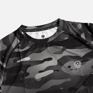 Detail shot of the Odyssey Activewear Dark Camo T-shirt showing the breathable, quick-drying fabric and black and grey camouflage colour scheme