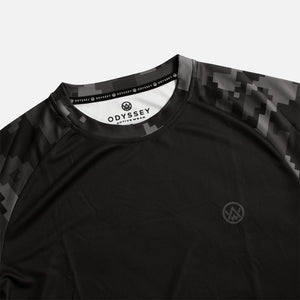 Detail shot of the Odyssey Activewear Stealth Digital Camo T-Shirt with a black and grey pixel colour scheme