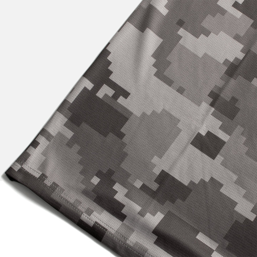 Detail shot of the Odyssey Activewear Urban Digital Camo jersey showing the breathable and quick-drying fabric