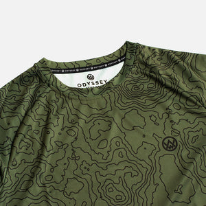 Detail shot of the Odyssey Activewear Contour Forest jersey showing the breathable, quick-drying fabric and green topographic map pattern