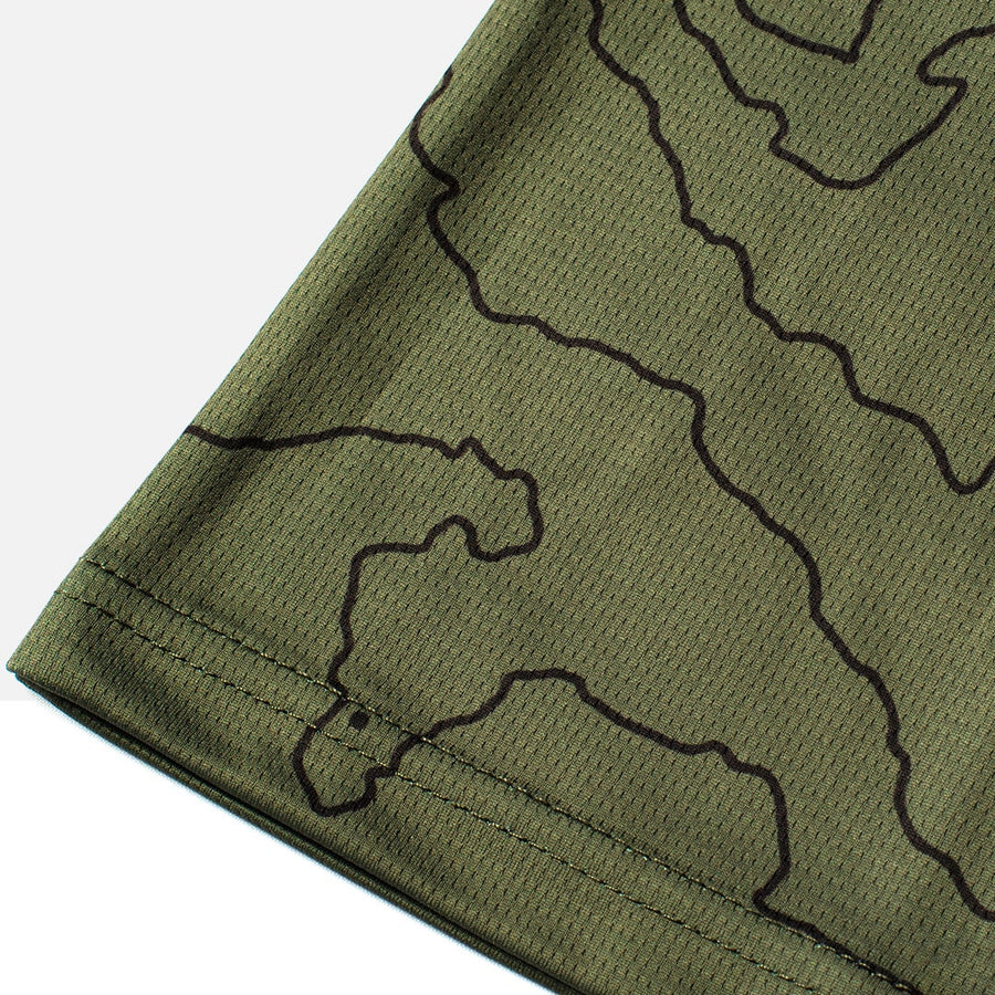 Detail shot of the Odyssey Activewear Contour Forest jersey showing the breathable and quick-drying fabric