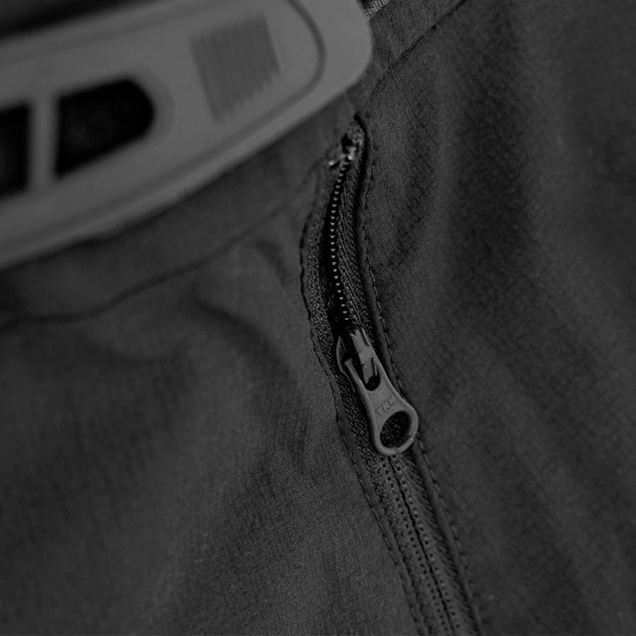Detail shot of the YKK zippers on the Odyssey Activewear Shield Trousers