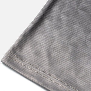 Detail shot of the Odyssey Activewear Triangulation Steel jersey showing the breathable and quick-drying fabric
