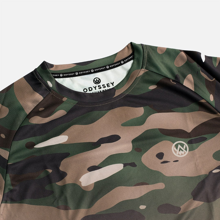 Detail shot of the Odyssey Activewear Woodland Camo T-shirt showing the breathable, quick-drying fabric and green and brown camouflage colour scheme